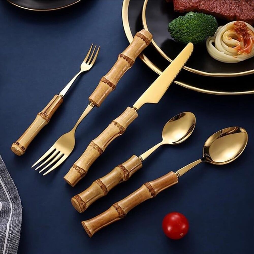 Gold- plated stainless steel natural bamboo cutlery set by US designers Natalia